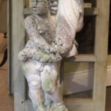 Reconstituted Stone FigureOf a Boy Holding up a LaterHam Stone Bird Bath