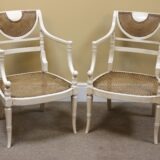 A Pair of Regency Painted Bergere Chairs